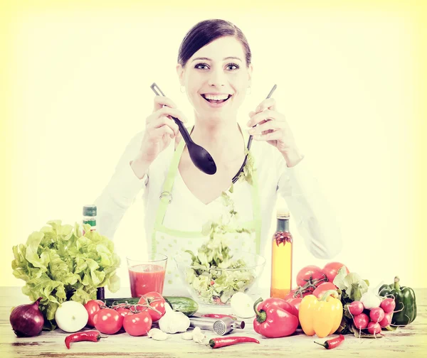 Happy housewife preparing salad. — Stock Photo, Image