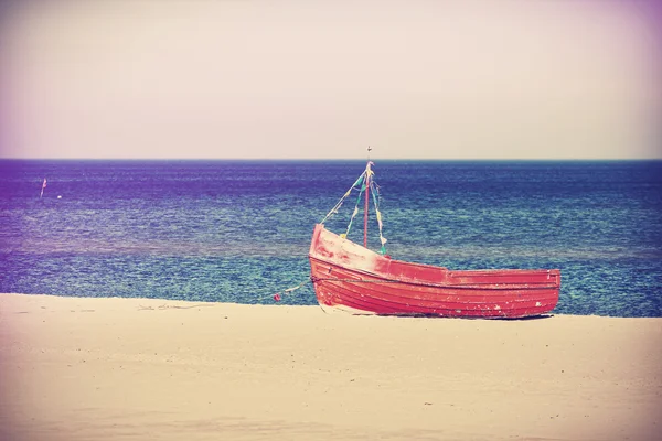 Vintage filtered photo of an old boat. — Stock Photo, Image
