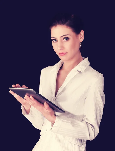 Young woman working on tablet computer. — Stock Photo, Image