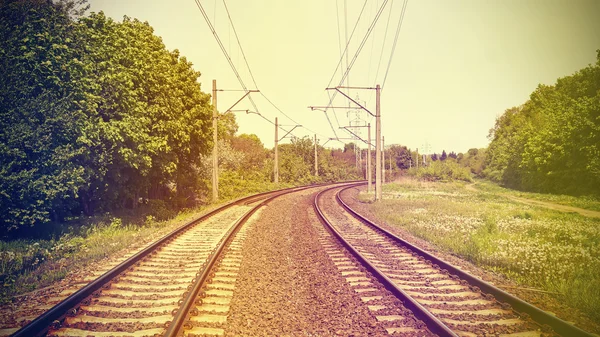 Retro imagem filtrada de trilhos ferroviários . — Fotografia de Stock