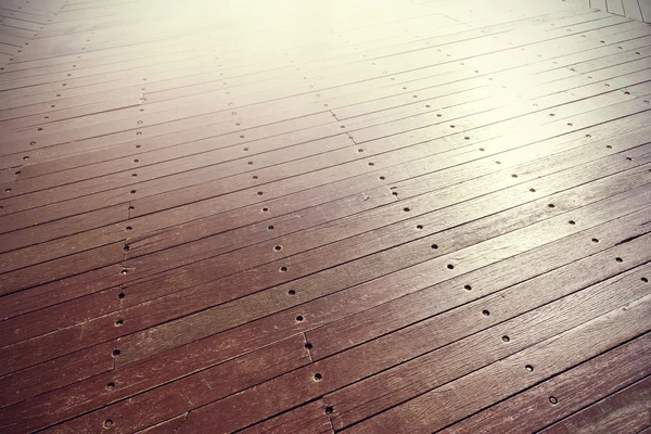 Puesta de sol reflejada en paneles de madera . — Foto de Stock