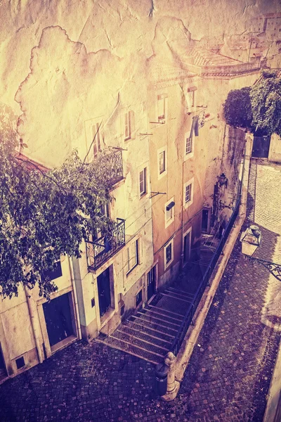 Old paper postcard filtered empty street in Lisbon, Portugal. — Zdjęcie stockowe