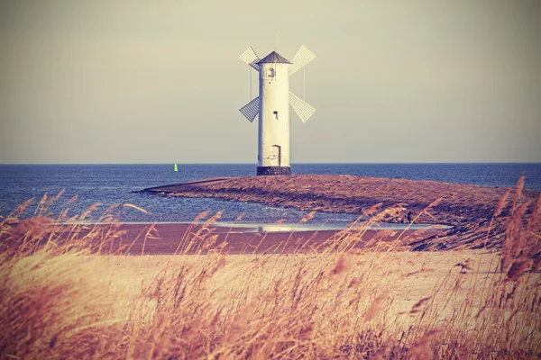 Retro vintage stylized lighthouse, Swinoujscie in Poland. — Stock Photo, Image