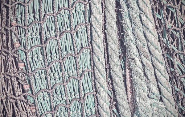 Retro vintage filtered abstract background made of fishing net. — Stock Photo, Image