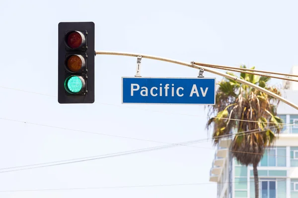 Pacific avenue street sign and traffic lights, California, USA. — Stock Photo, Image