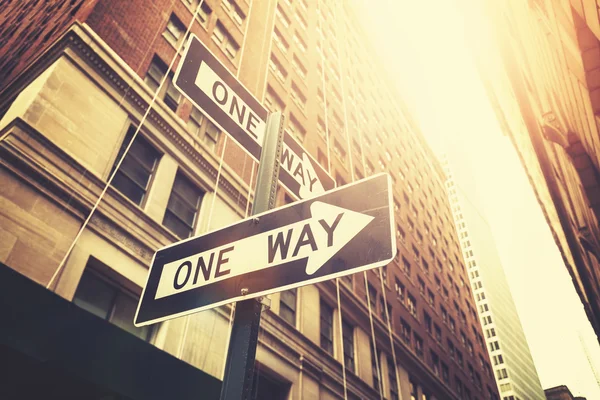 Retro style "one way" signs on street of Manhattan, NYC. — Stock Photo, Image