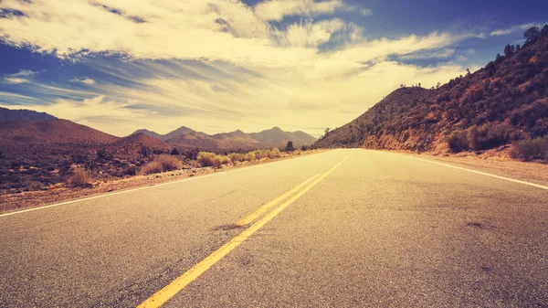 Vintage retro stylized desert road, USA — Stock Photo, Image