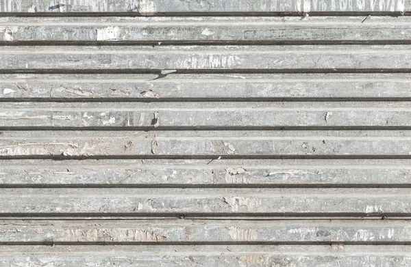 Grunge vlnité kovové texturu, rozmazané světla průmyslová. — Stock fotografie