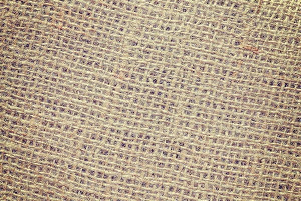 Vintage tonificado de alta qualidade close up imagem de tecido de juta . — Fotografia de Stock