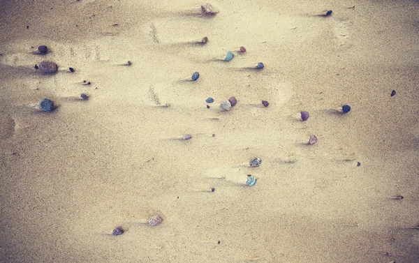 Naturaleza fondo abstracto hecho de piedras en una playa . — Foto de Stock