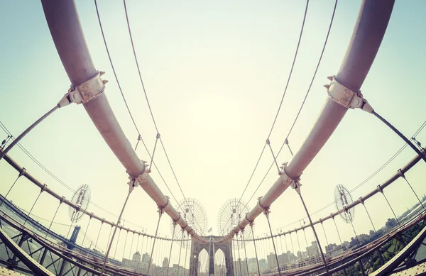 Vintage toned fisheye lens picture of Brooklyn Bridge, NYC. — Stock Photo, Image