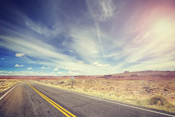 Vintage stylized endless country highway, USA. — Stock Photo, Image