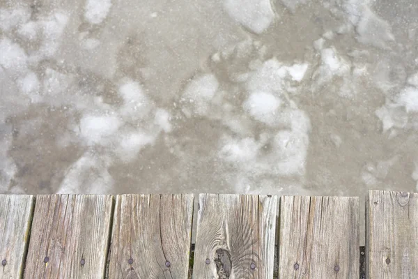 Antiguo muelle de madera sobre hielo, fondo abstracto con espacio para texto . —  Fotos de Stock