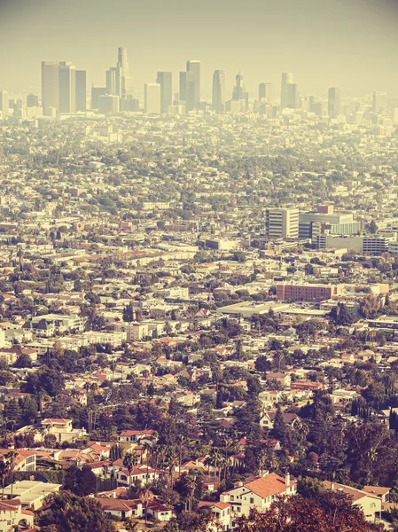 Retro stylized aerial view of Los Angeles seen through smog. — Stock Photo, Image