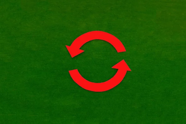 Two rounded red arrows on a green background. Cycle, movement, change.