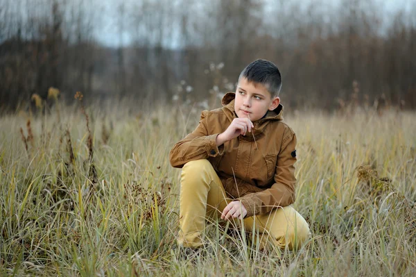 Beautiful boy outdoors, portrait, hipster. — Stock Photo, Image