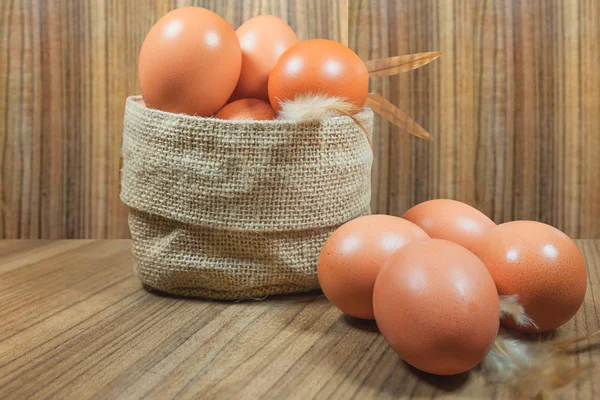 Eggs in basket on wood.eggs.egg.brown.rawfood — Stock Photo, Image