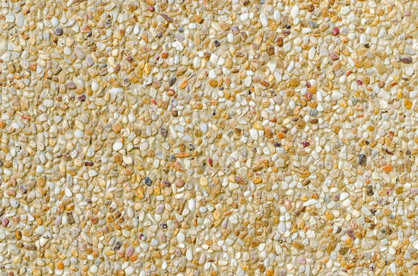 Yellow little stone background texture pattern — Stock Photo, Image