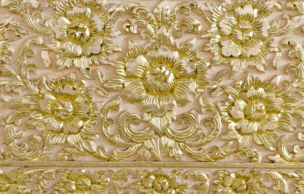 Pattern of flower carved on wood background — Stock Photo, Image