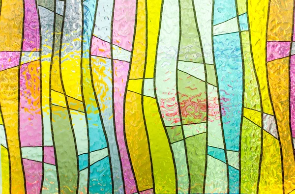 Veelkleurige gebrandschilderd glas kerk venster staand — Stockfoto