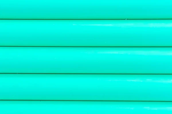 Patrón de tubería de plástico verde textura fondo —  Fotos de Stock