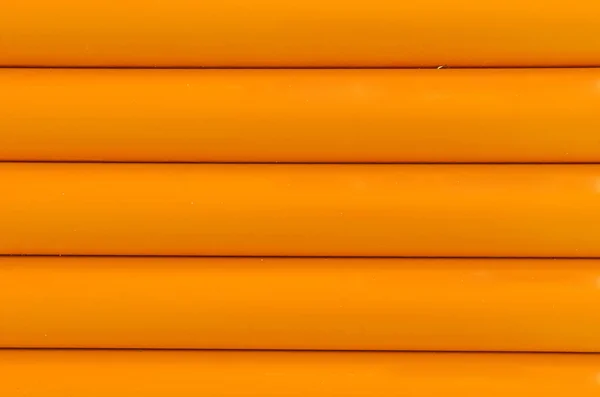 Orange Kunststoff Schlauchmuster Textur Hintergrund — Stockfoto