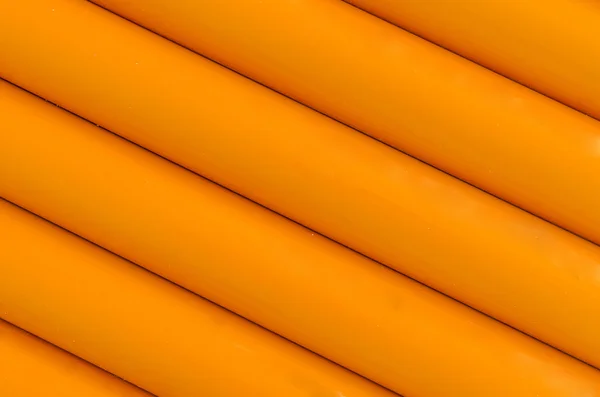 Orange Kunststoff Schlauchmuster Textur Hintergrund — Stockfoto