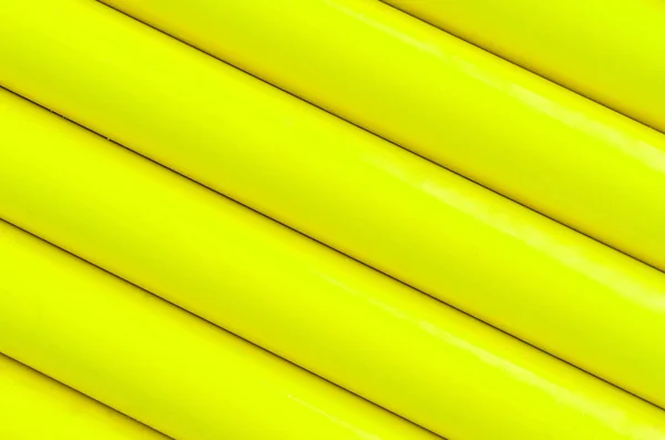 Tubes en plastique jaune motif texture fond — Photo