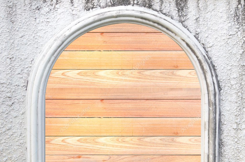 Wood door on the cement wall
