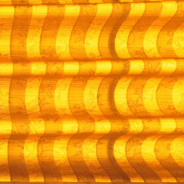 Persianas o cortinas de tonos cálidos y luz solar natural abstracta —  Fotos de Stock