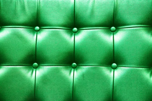 Closeup texture of vintage green leather sofa for background — Stock Photo, Image