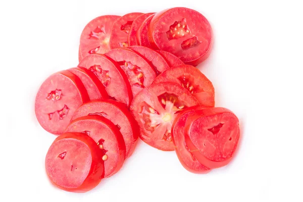 Fatias de tomate fresco isolado em branco — Fotografia de Stock