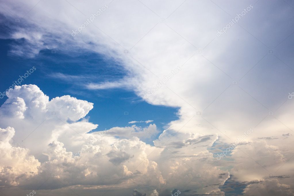 Blue sky with clouds and sun lighting