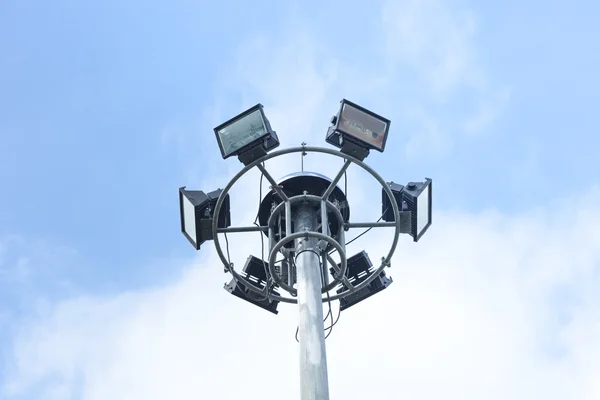 Stadium lights, isolated isolated on bule sky — Stock Photo, Image