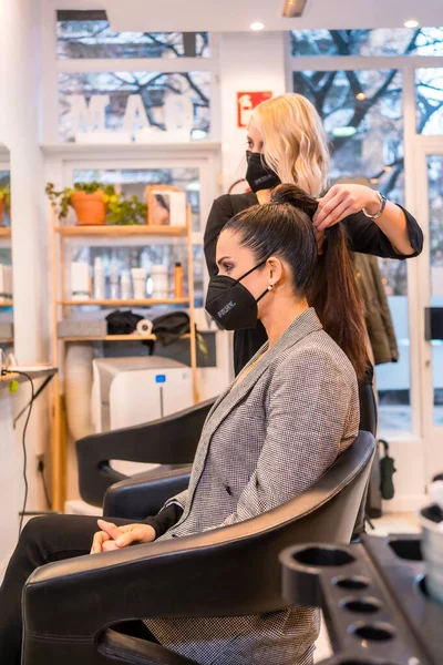 Caucasian Hairdresser Mask Giving Final Touches Brunette Client Hairstyle Security — Stock Photo, Image