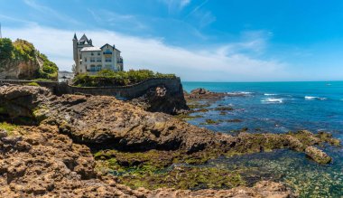 Castle on the Plage du Port Vieux on a summer afternoon. Municipality of Biarritz, department of the Atlantic Pyrenees. France clipart