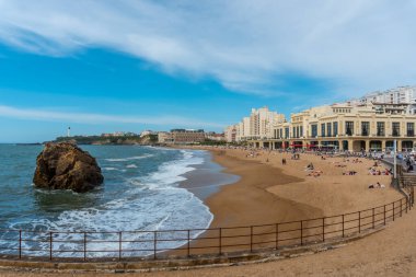 La grande Plage and its famous promenade in Biarritz, holidays in the south-east of France. Biarritz, department of Pyrenees-Atlantiques clipart