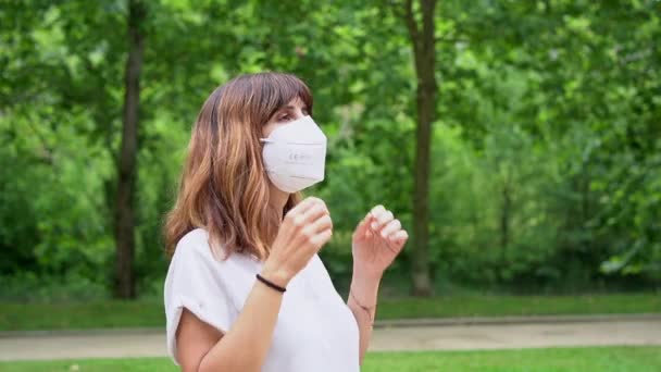 Young Woman Removing Her Surgical Mask Smiling End Coronavirus Pandemic — Video