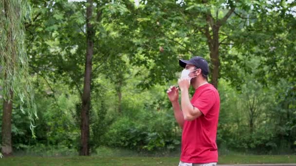 Young Man Red Shirt Removing His Surgical Mask End Coronavirus — Stok video