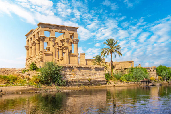 The beautiful temple of Philae and the Greco-Roman buildings seen from the Nile river, a temple dedicated to Isis, goddess of love. Aswan. Egyptian