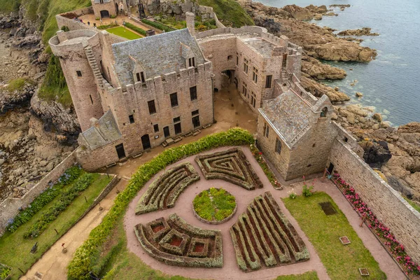 Gardens from above Fort-la-Latte castle by the sea at Cape Frehel and near Saint-Malo, Plevenon peninsula, French Brittany. France