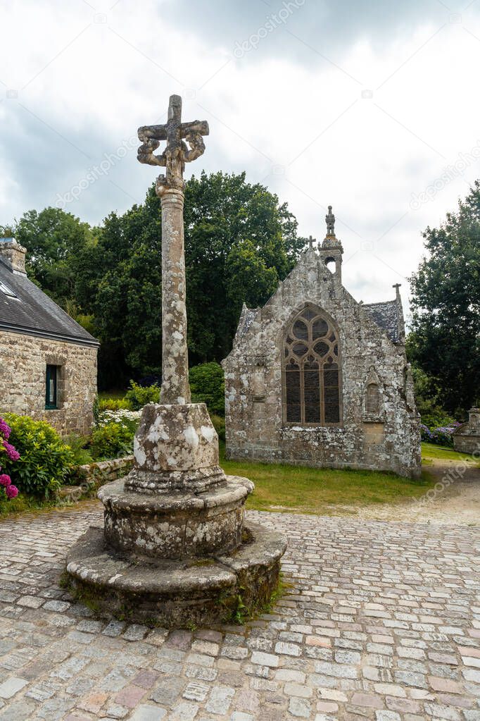 Sculpture next to the church of the medieval village of Locronan, Finistere, Brittany Region, France