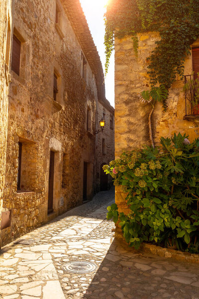 Pals medieval village, streets of the historic center at sunset, Girona on the Costa Brava of Catalonia in the Mediterranean