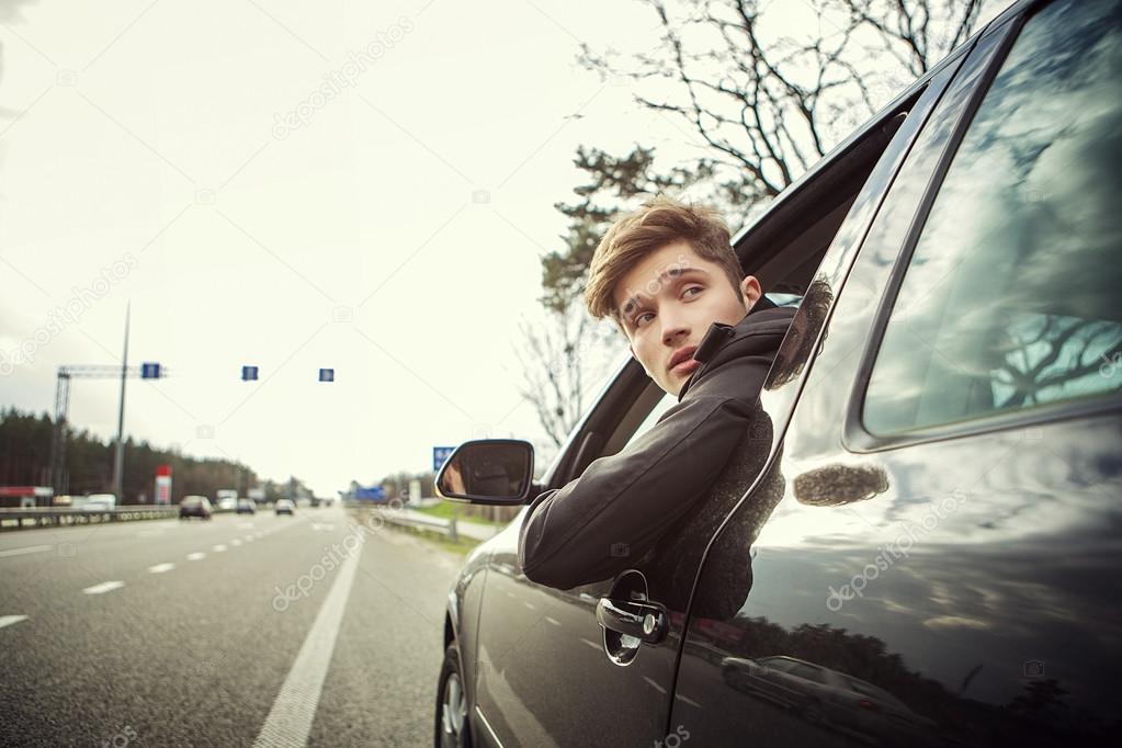 The young man behind the wheel,  traveling