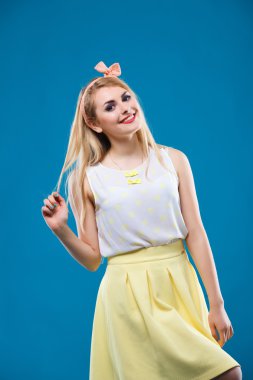 girl in the studio, pin-up, flirting, showing different emotions