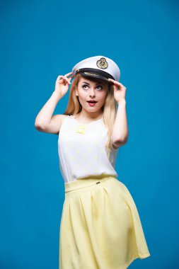 beautiful girl in style of pin-up, Dresses captain cap