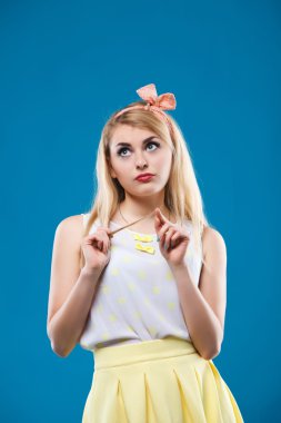 girl in the studio, pin-up, flirting, showing different emotions