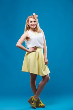 girl in the studio, pin-up, flirting, showing different emotions