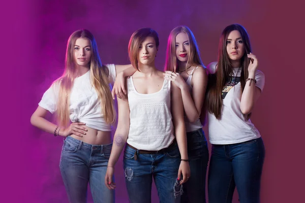 Music female artist, 4 beautiful girls, style, jeans, youth — Stockfoto