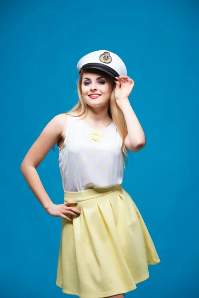 Beautiful girl in style of pin-up, Dresses captain cap — Stockfoto